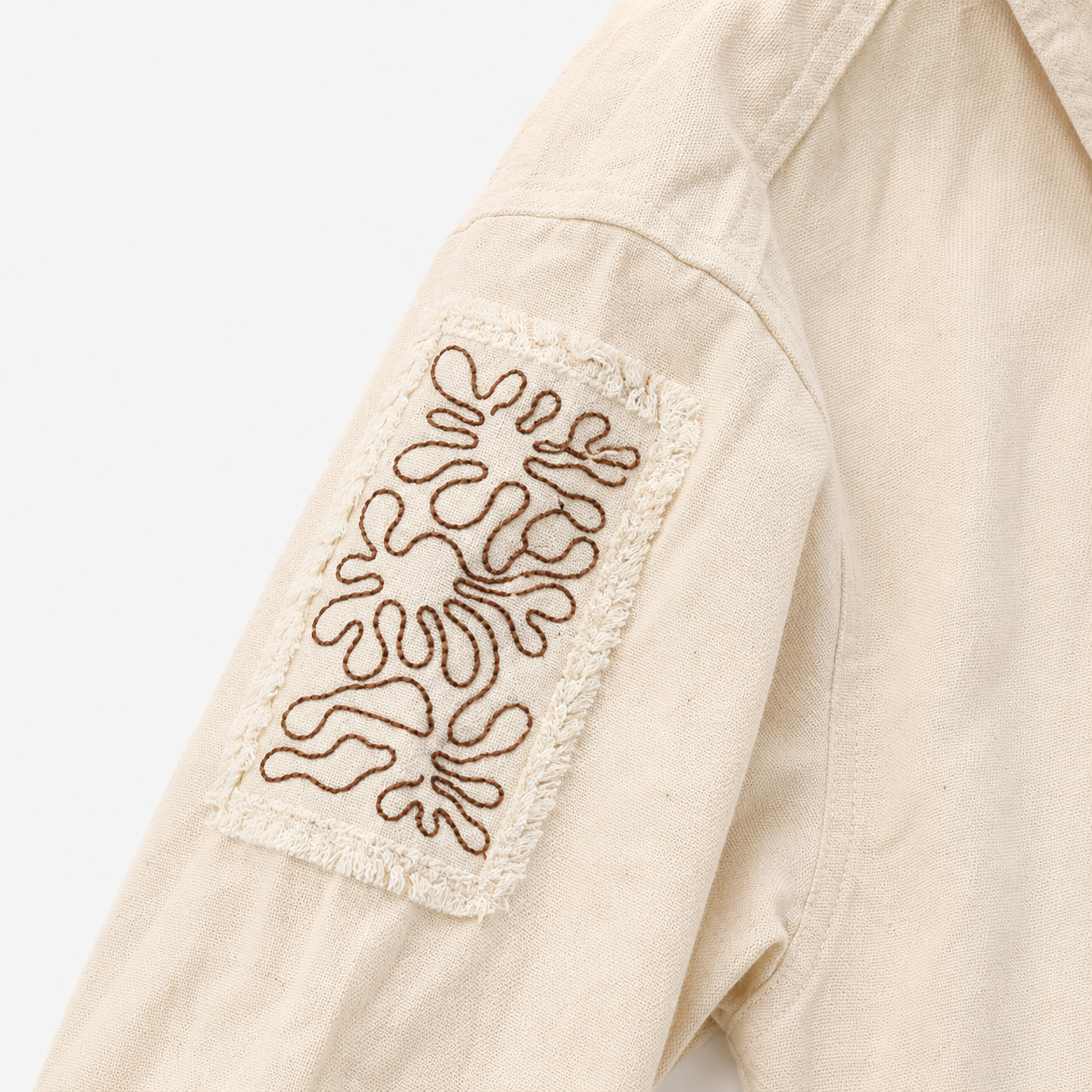 Girls’ Cream Full-Sleeve High-Low Shirt with Embroidered Sleeve Patch