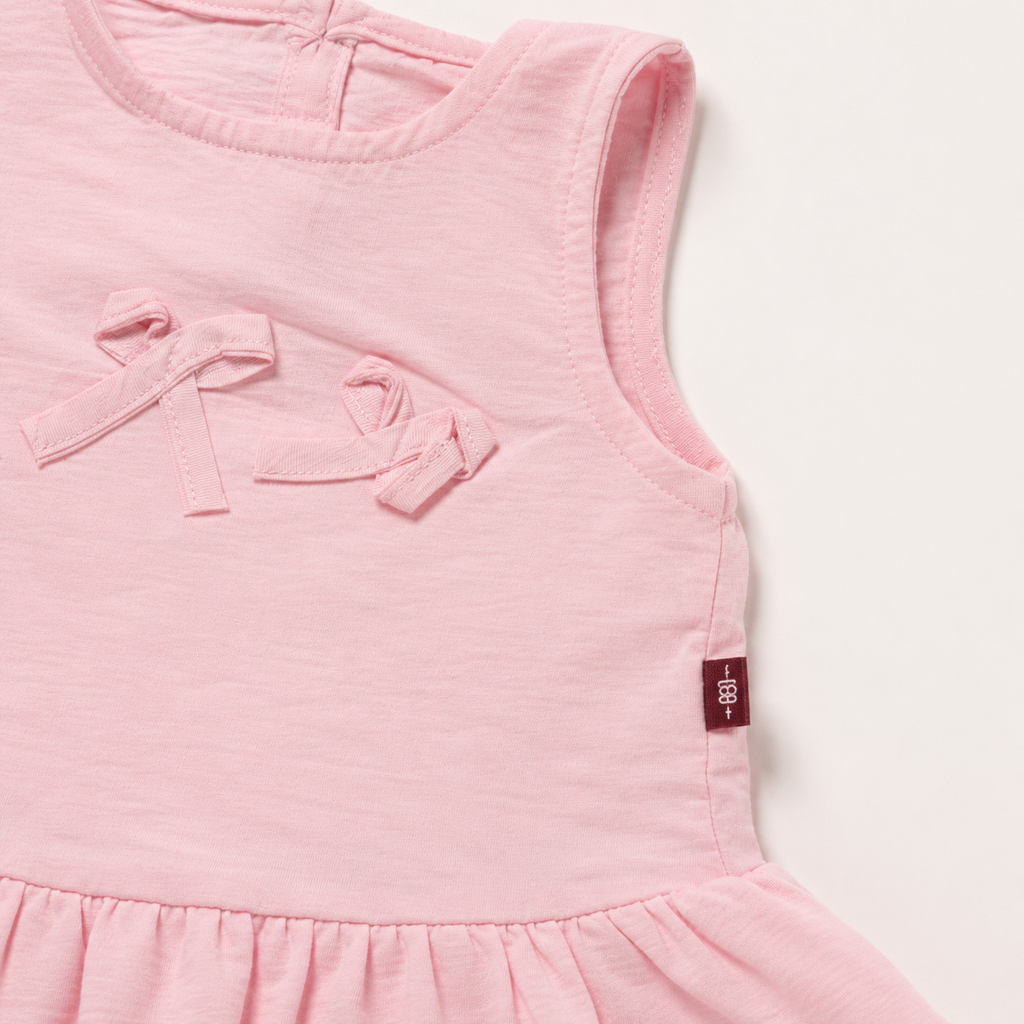 Baby Girls’ Light Pink Sleeveless Peplum Top with Decorative Bow Details