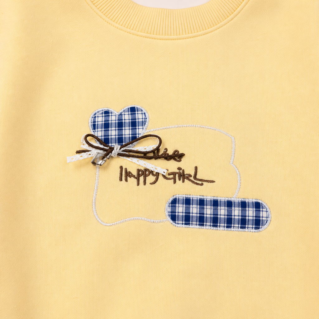 Girls’ Yellow Full-Sleeve Sweatshirt with Blue Checkered Ruffle Hem and Heart Appliqué